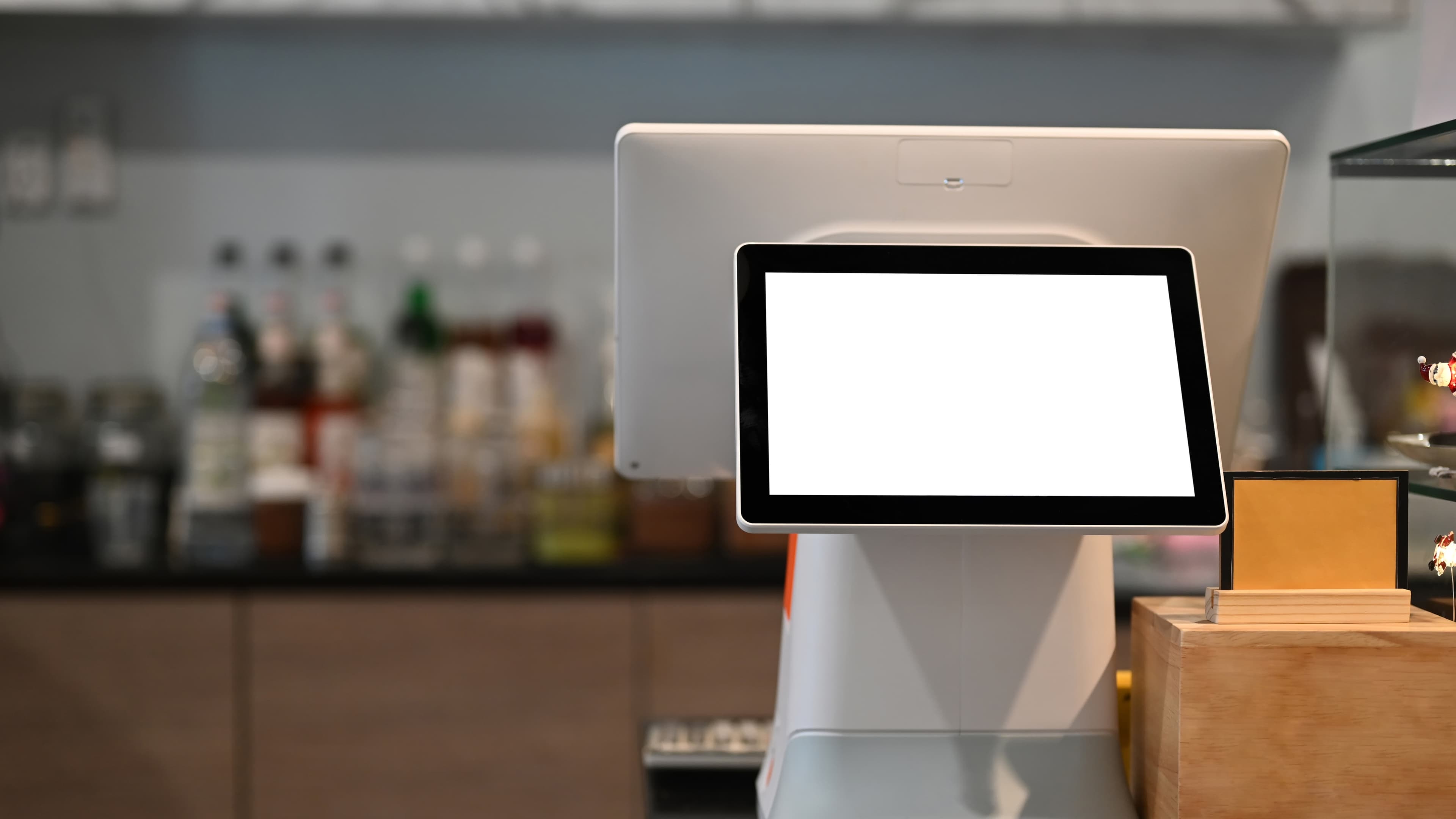 A countertop point-of-sale display in a café